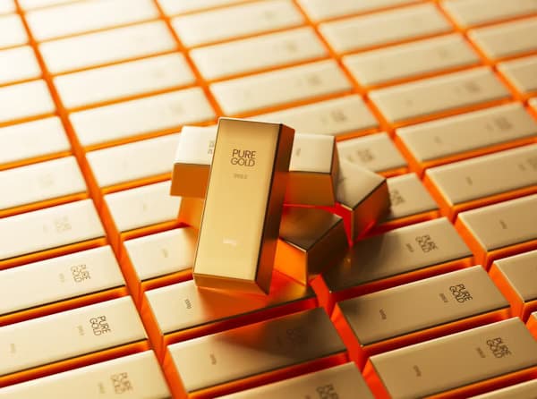 Stacks of gold bars representing wealth and financial security.